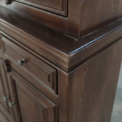 Close-up of the rich wooden texture and detailed craftsmanship on the corner of the Azul Display Cabinet, highlighting its elegant design and smooth finish.