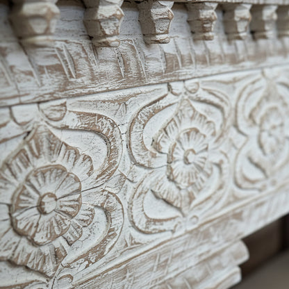 Hand-carved wooden floral pattern with distressed white finish, tribal home decor accent