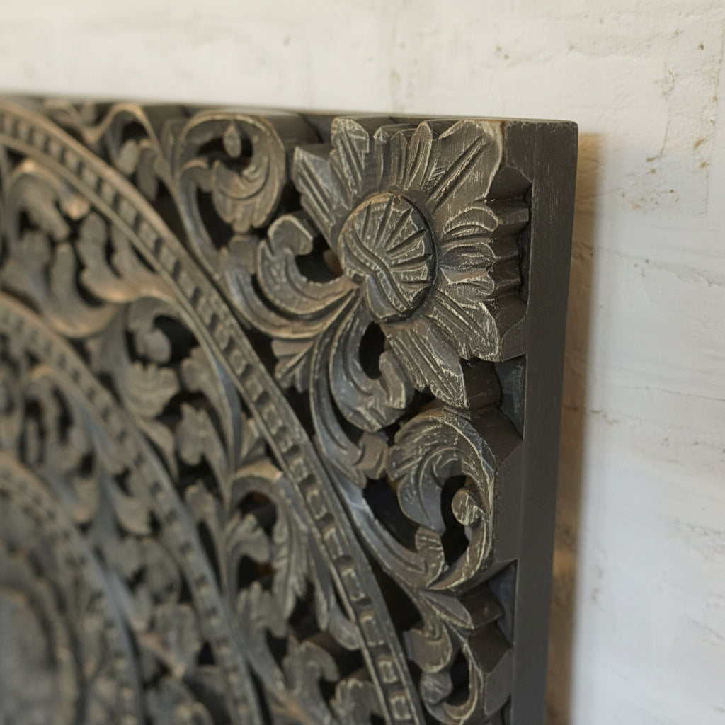 Hand-carved wooden wall art with intricate floral tribal patterns
