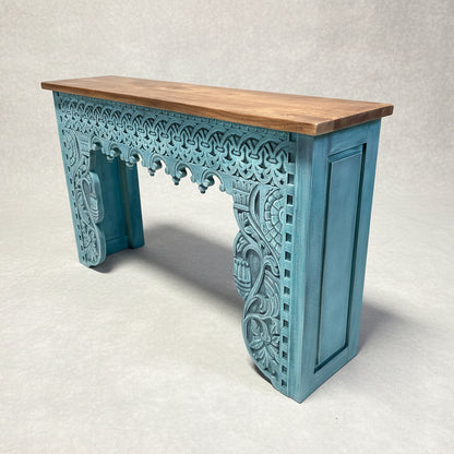Rani Carved Console Unit featuring intricate hand-carved wooden details in a turquoise finish with a natural wood top, perfect for elegant decor and artisanal interiors.