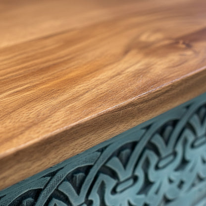 Close-up of the smooth wooden top and intricate hand-carved blue detailing of the Rani Carved Console Unit showcasing its elegant decor and craftsmanship.