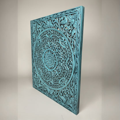 Hand-carved blue wooden wall art panel with intricate floral tribal patterns