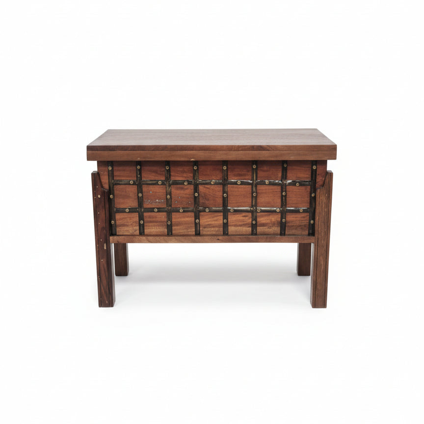 Wooden storage box with metal accents featuring a handcrafted tribal design, blending rustic decor and durable craftsmanship for unique home storage solutions.