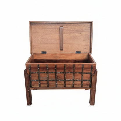 Sandook Metal Accent Storage Box showcasing a wooden handcrafted design with metal accents on a raised stand, ideal for decor and practical storage.