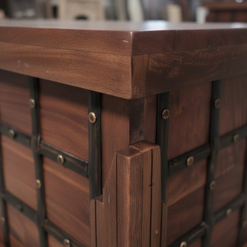 Close-up view of the wooden corner and metal accents of the Sandook Metal Accent Storage Box, showcasing its handcrafted decor and tribal handicrafts style.