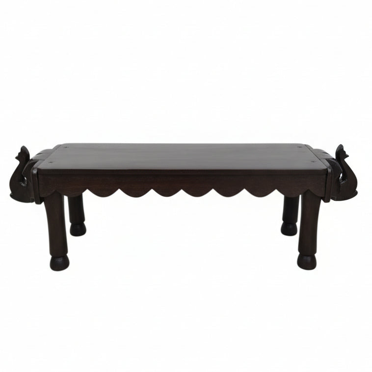 Vahana Carved Wooden Bench featuring intricately carved elephant head accents on both ends, showcasing traditional tribal handicrafts and detailed wooden decor design.