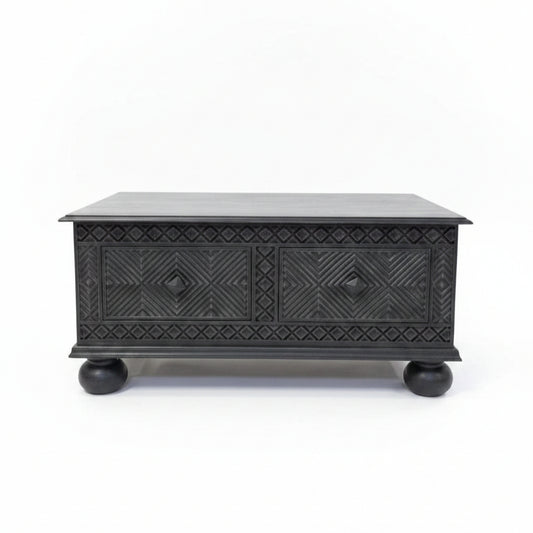 Yantra Storage Coffee Unit in dark wood with intricate tribal handicraft patterns, featuring two front drawers and rounded legs, perfect for stylish decor and storage.